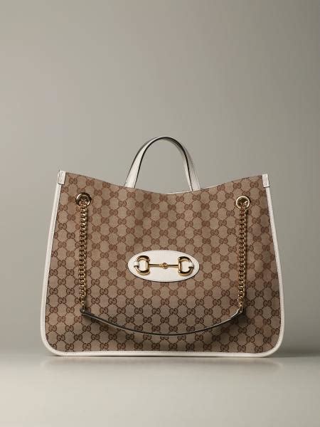 gucci lussemburgo|white gucci shopping bag.